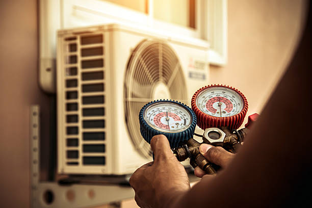 Professional Hvac technician working in Needville, TX
